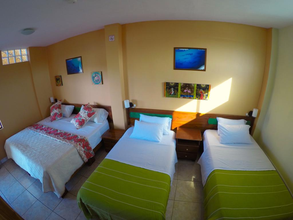 Dolphin House Hotel ปูแอร์โต บาเกริโซ โมเรโน ภายนอก รูปภาพ