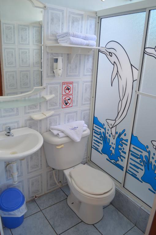 Dolphin House Hotel ปูแอร์โต บาเกริโซ โมเรโน ภายนอก รูปภาพ